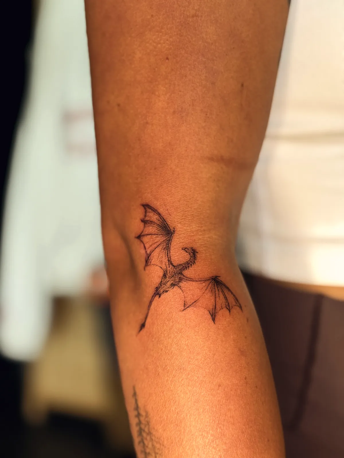 Tiny Dragon, tattoo by Alyssa Collins